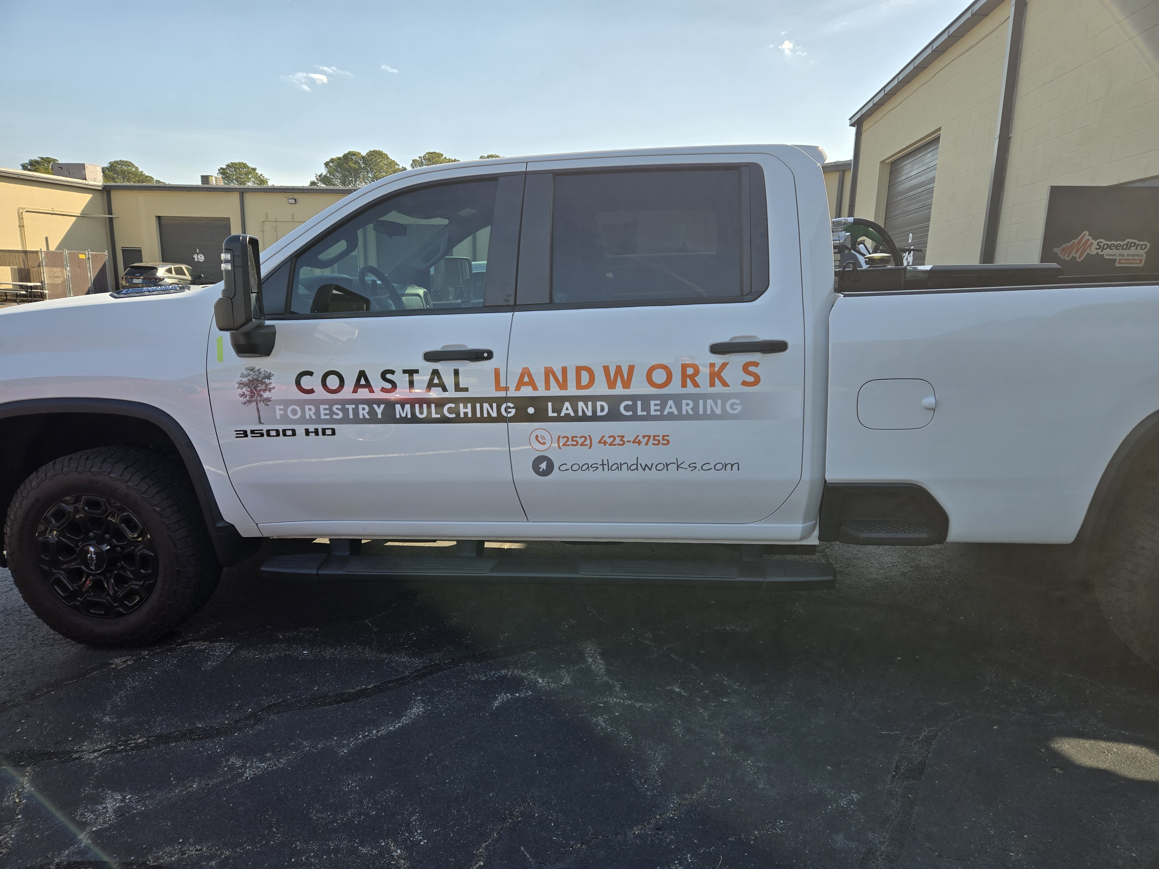 Coastal truck graphics installation